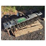 Gator rator aerator mounts to front of zero turn mower