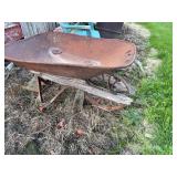 Vintage garden wheel barrel and plastic chair