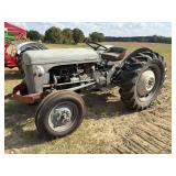 Ferguson 30 Tractor, new front tires and battery, runs but clutch plate appears to be stuck to flywheel.