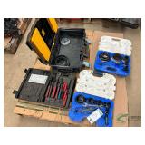 Pallet of hole saws and snap ring pliers