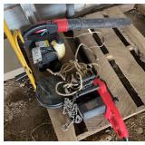 Wind up extension cord, fluorescent light, log lifter, aluminum shovel, gas leaf blower, electric chain saw, & block and tackle bldg:locked