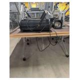 (4) Tables with outlets.  Does not include items on top of table!