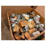 Box with numerous electrical fittings and parts