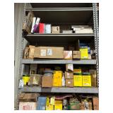 Contents of shelf numerous parts for log skidder