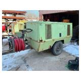 Sullair 185 Air Compressor with hoses showing 2825 hours