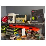 Contents of top 2 shelves chain saw safety equipment