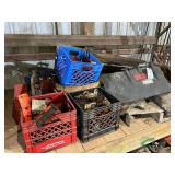 Crates of trimmer and saw parts