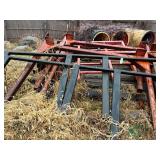 Steel rakes for log hauling on trailers