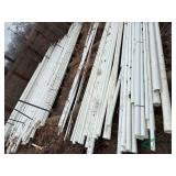 Numerous new sticks of PVC pipe assorted sizes