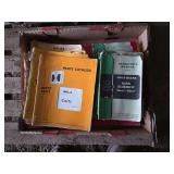 Box of John Deere & International Harvester manuals, bldg:locked