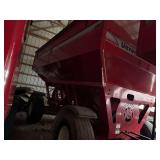 Unverferth 530 gravity wagon with brakes, lights, and roll tarp