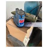 Breeding supplies, semen thaw cup, gun warmer and partial box of  Sheath Protector tubes