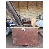 Large vintage bin on casters with contents, bldg:green