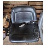 Lawn and garden tractor seat, came off of JD tractor, bldg:locked