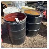 (2) steel 55 gallon barrels & (2) plastic 55 gallon barrels, row:4