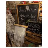 Signs, various sizes and surfaces, storage racks