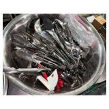 Bowl of serving tongs