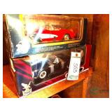 (2) Die cast cars in boxes