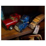 (3) Toy trucks