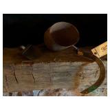 Vintage feed scoops and hay knife