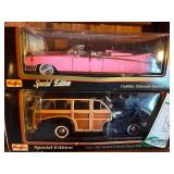 (2) Die cast cars in boxes