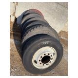Various size mounted truck tires and rims