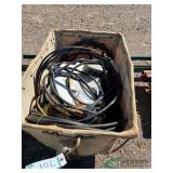 Bin of assorted cord and electrical parts