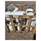 Crate of sewer pipe fittings