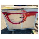 Steel cabinet with used engines and parts