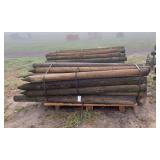 (2) Bundles of fence posts, row:4