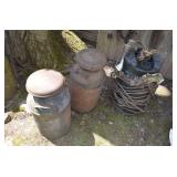 milk cans and roll of long cable