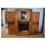 large entertainment center with tv
