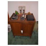 Wooden cabinet and contents