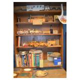 contents of shelving unit wooden toys