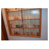 wood figurines and contents of shelf