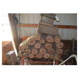 bird feeder and sections of hardwood for lathe work