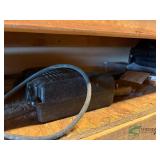Contents on shelf of tools