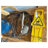 Copper wire, fuel can and caution sign