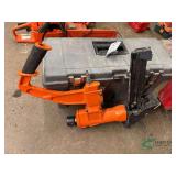 Carpet stapler and toolbox of carpet tools