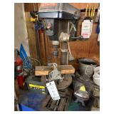 Ryobi Drill press and items in corner of bench