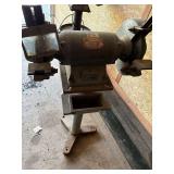 Bench grinder on stand