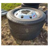 (2) 245/70R19.50 Tires on 10 lug hub pilot polished aluminum wheels, row:7