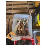 Plastic tote of tools, bldg:locked