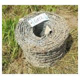 Roll of unused barbed wire, row:6