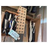 (2) Boxes of knives, bldg:locked
