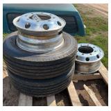 (2) 19.5 Tires on aluminum rims & (2) aluminum 8 bolt rims, row:8