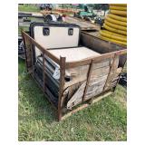 Steel crate with numerous camper doors/hatches, row:8