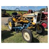 Farmall Cub Lowboy with cultivators and sprayer