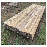 (65) 2x4x12 Treated Lumber, row:9