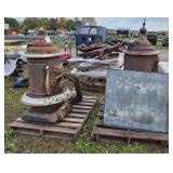 (1) round oak stove & (1) vintage stove, row:10